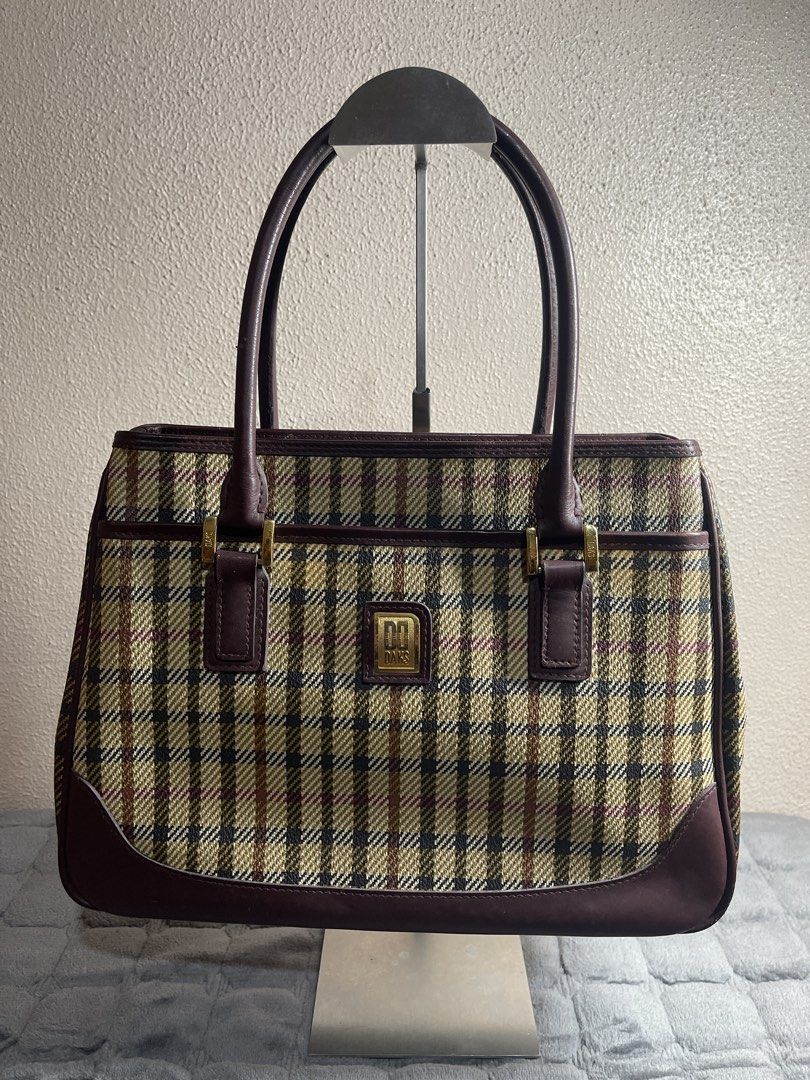 DAKS Plaid Leather Trim Hand Bag (Category: Tote Bags) located in Quezon City. Submitted by donnabelle7572 (Listing ID 1461439271, Image 1). Description: - Classic DAKS Hand bag - Timeless plaid pattern with rich leather trim - Spacious interior for essentials - Elegant gold-tone hardware - Comfortable top handles for easy carrying - Stylish everyday bag.