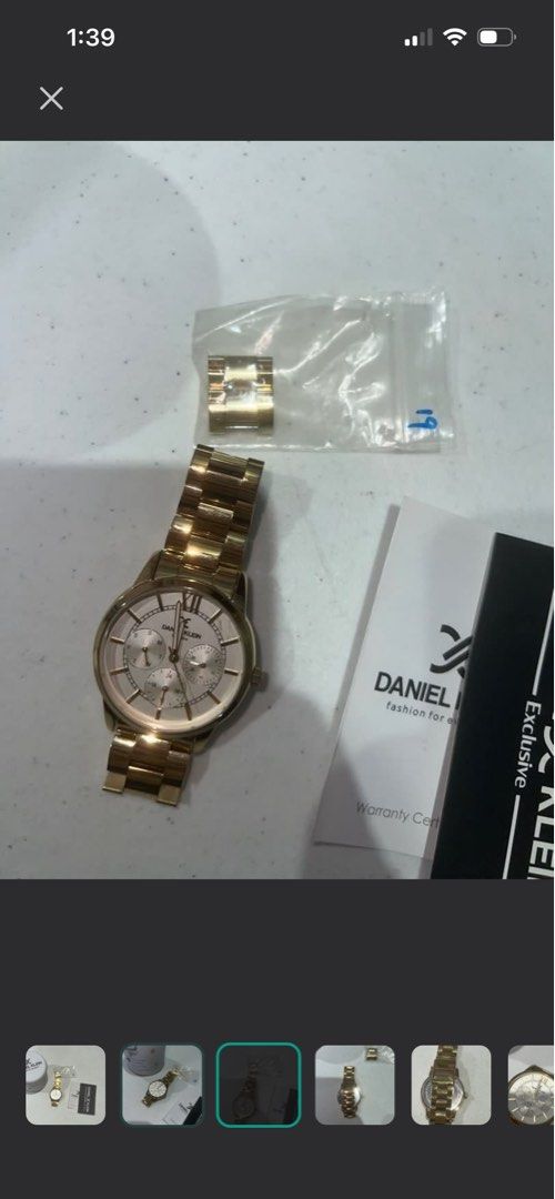 Daniel Klein Large Face Gold Watch (Working) (Category: Women's Watches) located in Quezon City. Submitted by chloe_declutter (Listing ID 1461377474, Image 2). Description: Cubao QC loc Rfs not using anymore In working condition With original receipt .
