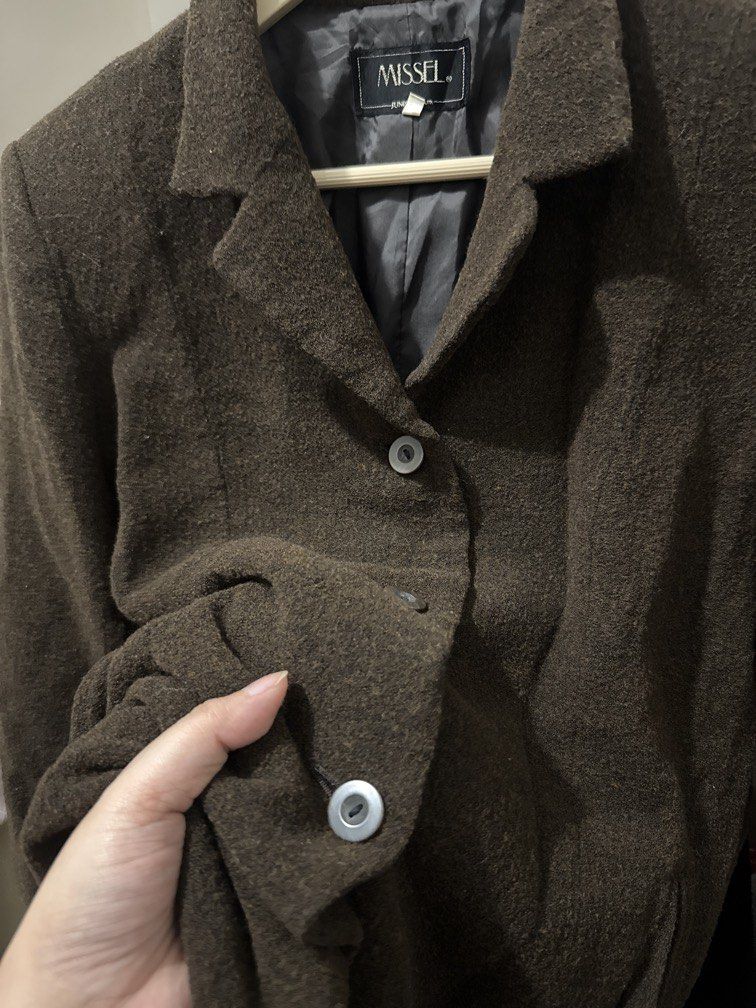 Dark Brown Wool Blazer (Category: Coats, Jackets and Outerwear) located in Mexico. Submitted by studioleraph (Listing ID 1461488737, Image 2). Description: 🛍️ Perfect for your personal wardrobe or reseller business 🫶 👗 The actual item being sold is the original garment shown in the product photos. Small differences in fit, drape, color, texture, or details may occur. 💌 Condition: • Preloved; Please wash the items before wearing. • Please mana