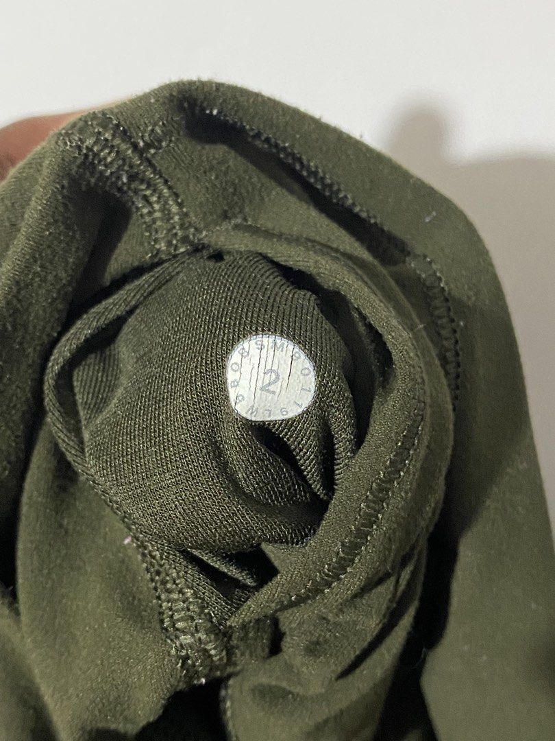 dark olive green Lululemon athletic leggings (Category: Activewear) located in Naga. Submitted by jamesarkkkk (Listing ID 1461503097, Image 3). Description: .