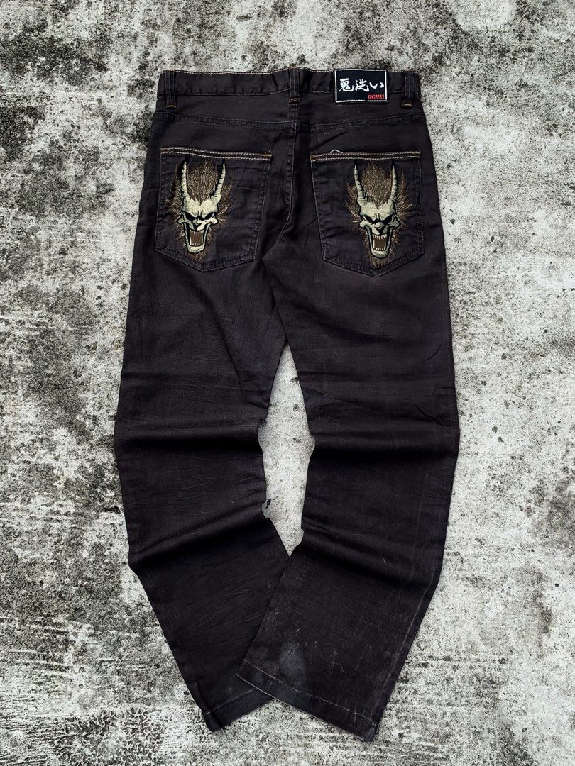 Dark Wash Jeans with Embroidered Dragon Pockets (Category: Jeans) located in Manila. Submitted by fiercefox.4ae806 (Listing ID 1461459869, Image 1). Description: - Dark wash denim jeans - Straight leg fit - Unique embroidered dragon designs on back pockets - Brand logo detail at the top - Perfect statement piece for your outfit.