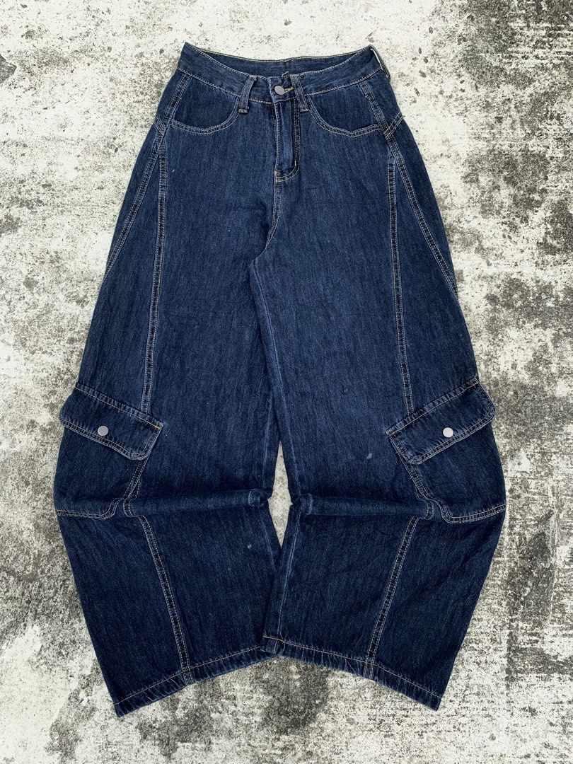 Dark Wash Wide Leg Cargo Jeans (Category: Jeans) located in Manila. Submitted by fiercefox.4ae806 (Listing ID 1461460046, Image 1). Description: - Dark wash denim jeans - Wide leg fit - Cargo pockets on the sides - Button and zip closure - Stitching details throughout - Relaxed fit.
