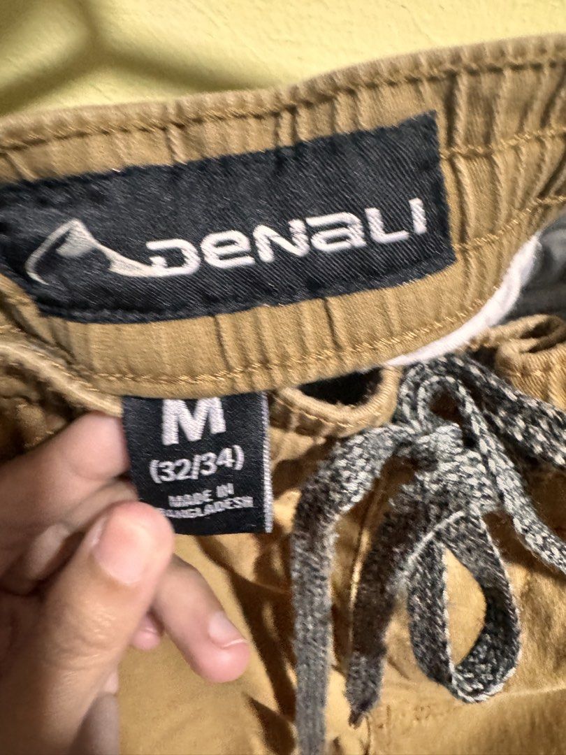 Denali Cargo Pants Size M (32/34) Tan (Category: Jeans) located in Obando. Submitted by Wintermelonzzzz (Listing ID 1461334157, Image 2). Description: - Brand: Denali - Color: Tan - Style: Cargo Pants - Size: Medium (fits waist 32-34) - Features: Elastic waistband with drawstring, multiple pockets - Origin: Made in Bangladesh - Ideal for: Casual wear.