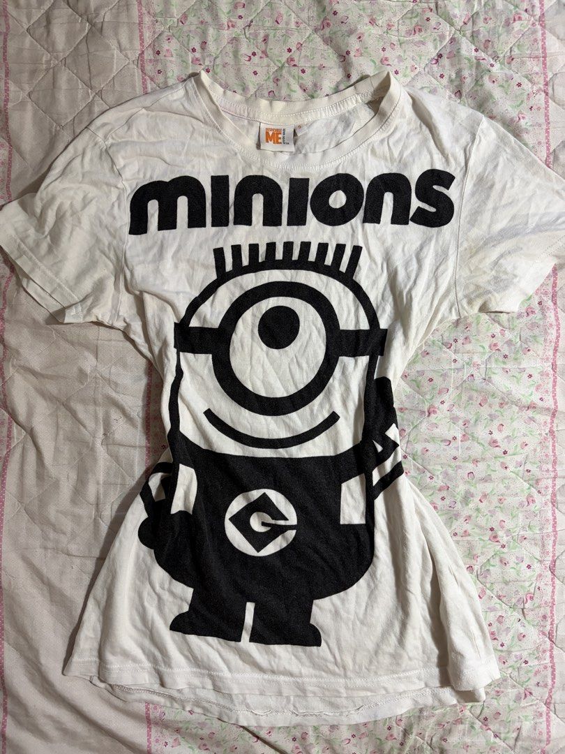 Despicable Me Minion Top (Category: Blouses) located in Muntinlupa City. Submitted by herellas0504 (Listing ID 1461365554, Image 1). Description: Despicable Me Minion Top Mine: 99 | Lock: 150 small-med w/ yellow stain (need wash).