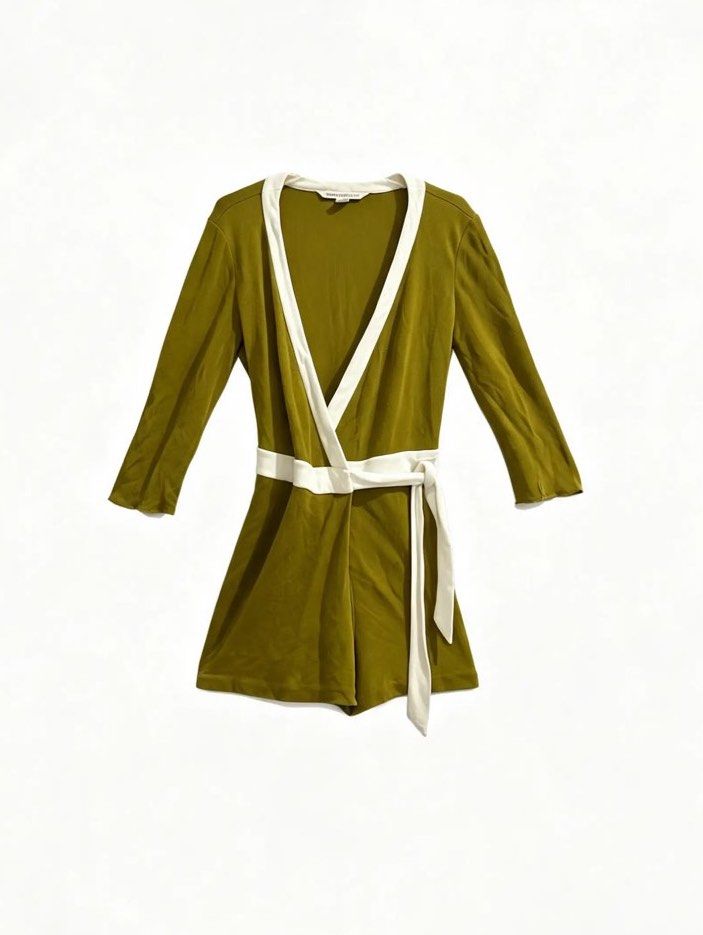 DIANE VON FURSTENBERG (Category: Rompers) located in Davao. Submitted by sart0ria85 (Listing ID 1461408605, Image 1). Description: A metallic, sexy romper of dark yellow mustard with white linings. 100% VISCOSE MADE IN CHINA 🇨🇳 SMALL. Size 4 EXCELLENT CONDITION (91/100).