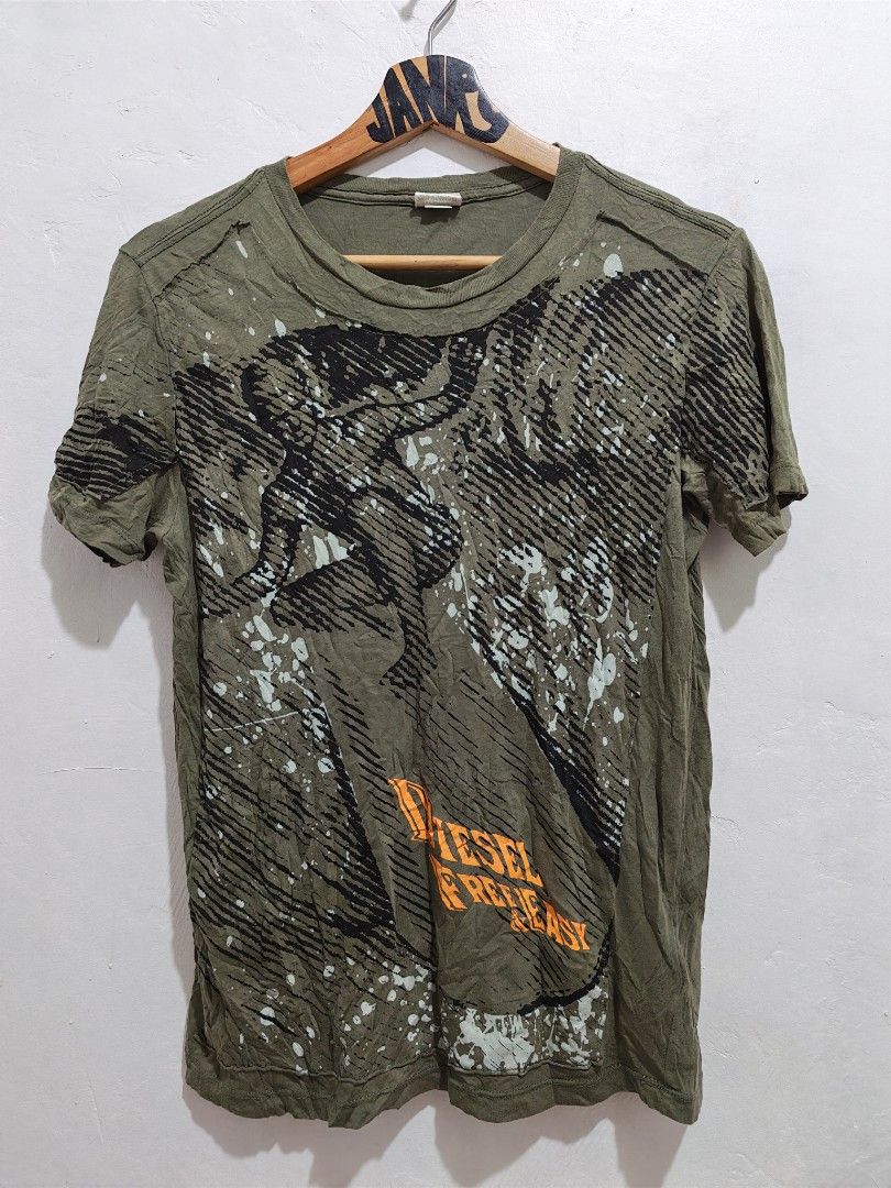 DIESEL FREE AND EASY SURF MAN GRAPHIC (Category: Formal Shirts) located in Pili. Submitted by janrypalmerodelima (Listing ID 1461469646, Image 1). Description: DIESEL FREE AND EASY SURF MAN GRAPHIC DIMES: 24x16 CONDITION: EXCELLENT COLOR RATE: 10/10 ISSUE: NONE.