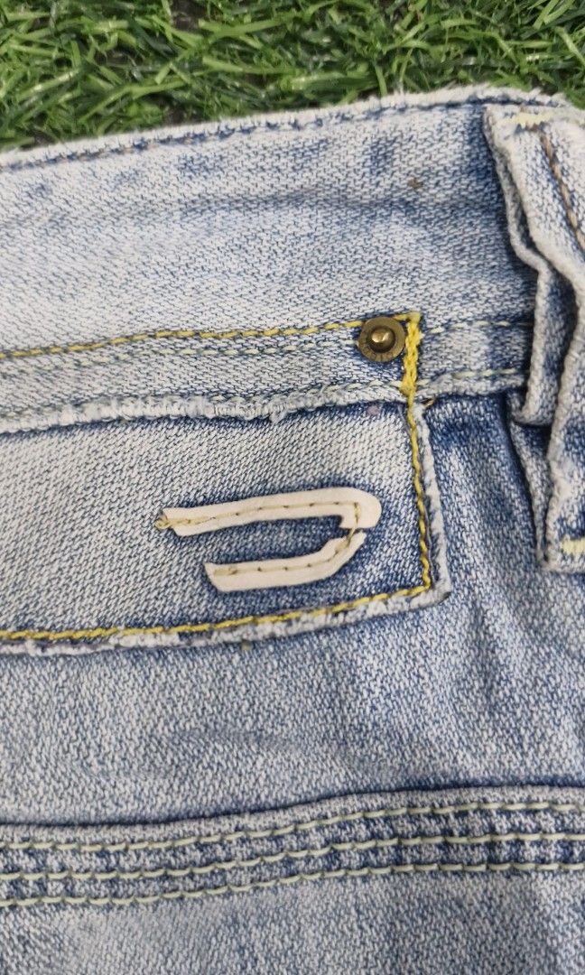 Diesel preeto jeans (Category: Jeans) located in Pili. Submitted by the_g_thrift (Listing ID 1461469601, Image 3). Description: diesel preeto jeans size 31 x 34 on tag size 34 tape measure length: 45 hem: 10 veru good condition needwash washable yellow dirt stain.