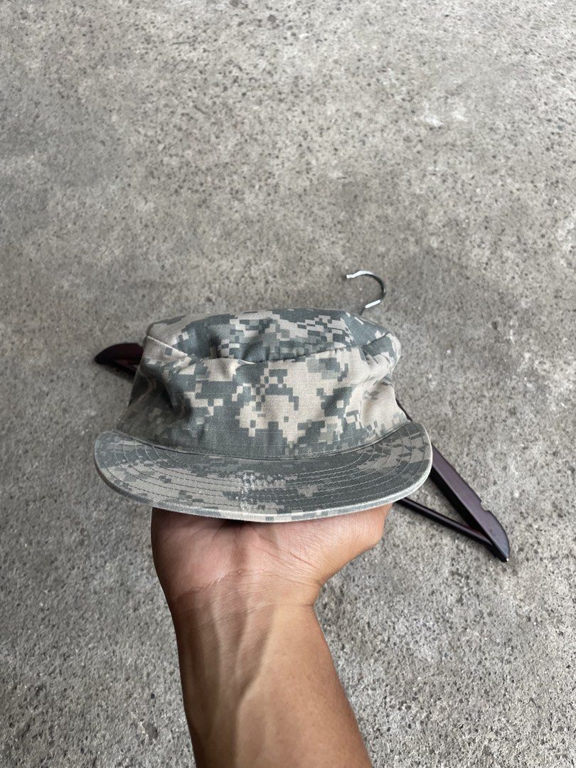 Digital Camo Military Style Cap (Category: Caps & Hats) located in Polomolok. Submitted by madagascarts (Listing ID 1461450453, Image 1). Description: - Digital camouflage pattern cap - Military style design - Flat top with a brim - Boonie hat silhouette - Ideal for outdoor activities or casual wear.