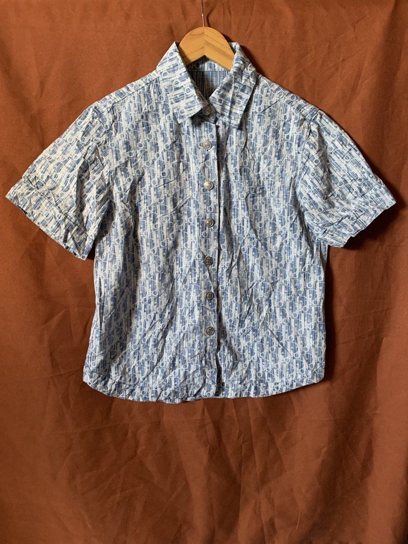 Dior Monogram Short Sleeve Button Up Shirt (Category: Shirts) located in Davao. Submitted by cheineebau09680 (Listing ID 1461475982, Image 1). Description: - Classic Dior monogram shirt - Iconic blue and white pattern - Short sleeves - Button-up front - Lightweight fabric, ideal for warm weather - Stylish addition to your wardrobe - Please check label for sizing.