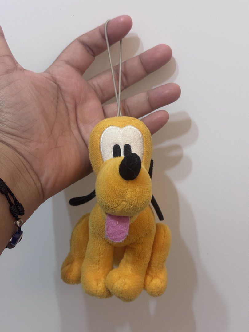 Disney 100 Pluto Plush Charm (Category: Plushies & Soft Toys) located in Antipolo. Submitted by bhabiegraciefashionlab (Listing ID 1461439855, Image 1). Description: 💸Mop - Gcash 🛵Mod - J&T Express /Lalamove /pick up 🏡Our Loc - Upper Antipolo City (Exact address to be discussed) 📸Actual Photo/s posted. WYSIWYG ✅Shipping Sched 👉🏻J&T Express ~ MWF 👉🏻Lalamove ~ Same Day Delivery, everyday pero message muna before booking ❌NO COD/COP/SCO/TCO 