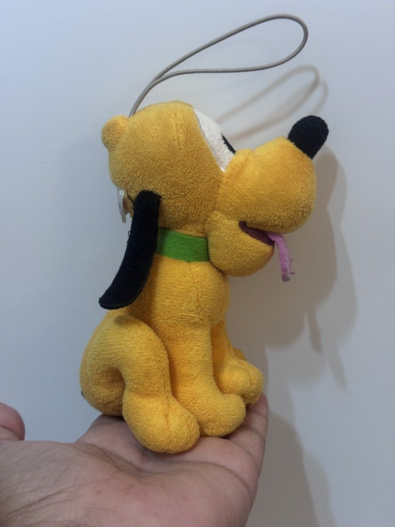 Disney 100 Pluto Plush Charm (Category: Plushies & Soft Toys) located in Antipolo. Submitted by bhabiegraciefashionlab (Listing ID 1461439855, Image 3). Description: 💸Mop - Gcash 🛵Mod - J&T Express /Lalamove /pick up 🏡Our Loc - Upper Antipolo City (Exact address to be discussed) 📸Actual Photo/s posted. WYSIWYG ✅Shipping Sched 👉🏻J&T Express ~ MWF 👉🏻Lalamove ~ Same Day Delivery, everyday pero message muna before booking ❌NO COD/COP/SCO/TCO 