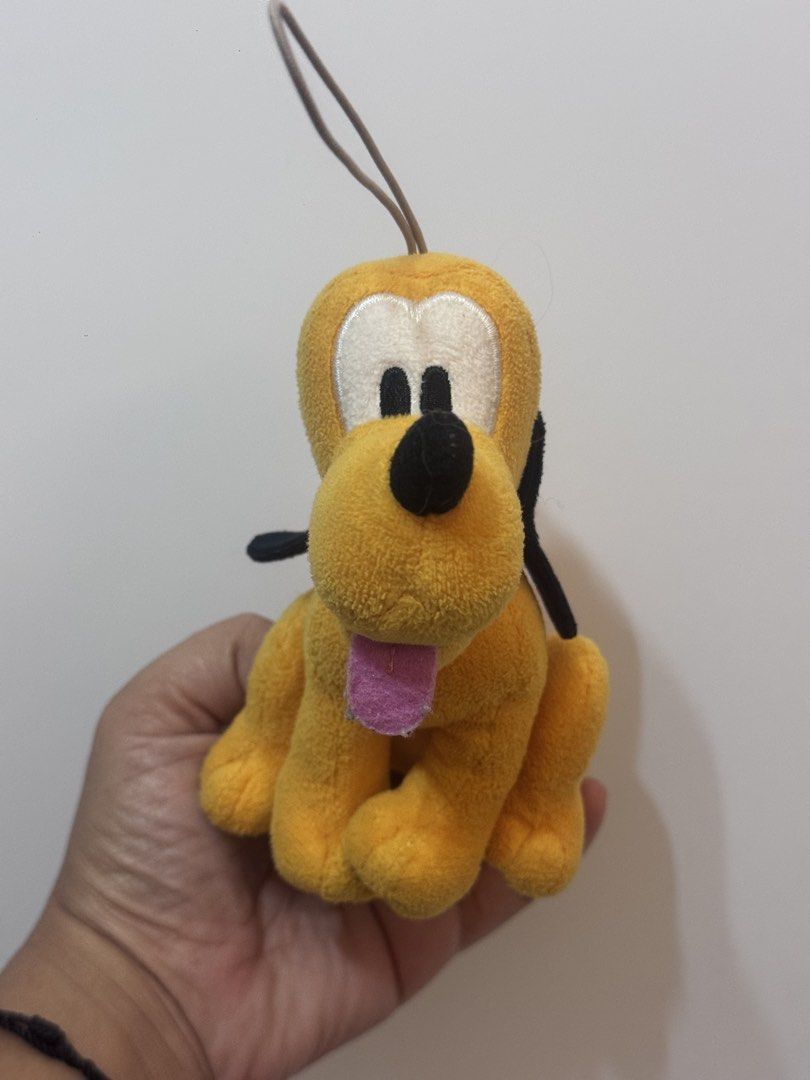 Disney 100 Pluto Plush Charm (Category: Plushies & Soft Toys) located in Antipolo. Submitted by bhabiegraciefashionlab (Listing ID 1461439855, Image 2). Description: 💸Mop - Gcash 🛵Mod - J&T Express /Lalamove /pick up 🏡Our Loc - Upper Antipolo City (Exact address to be discussed) 📸Actual Photo/s posted. WYSIWYG ✅Shipping Sched 👉🏻J&T Express ~ MWF 👉🏻Lalamove ~ Same Day Delivery, everyday pero message muna before booking ❌NO COD/COP/SCO/TCO 