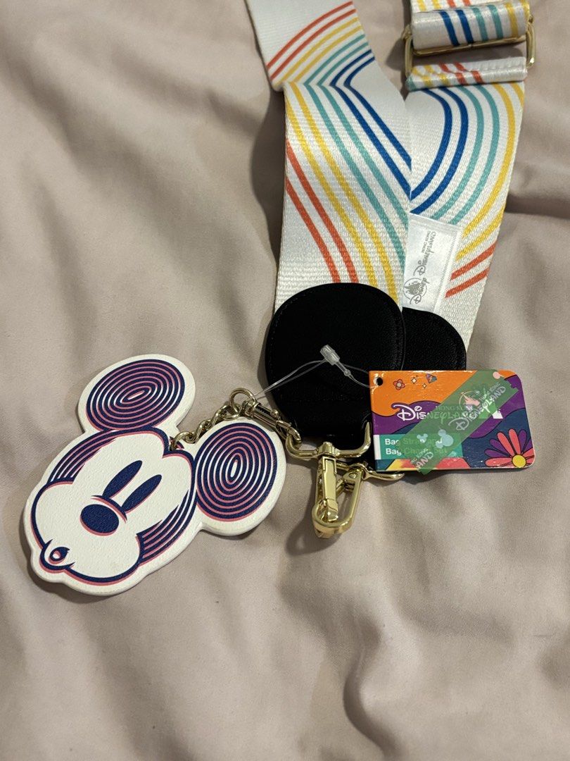 Disney Mickey Mouse Bag Strap (Category: Character Goods) located in Quezon City. Submitted by shopwithfrance (Listing ID 1461548396, Image 2). Description: - Cute Disney lanyard with rainbow and 'Chill Hang Loose' design - Features a Mickey Mouse head charm - Includes an official Disney Parks tag - Adjustable strap for comfortable wear - Ideal for keys, passes, or cameras - A must-have for any Disney fan!.
