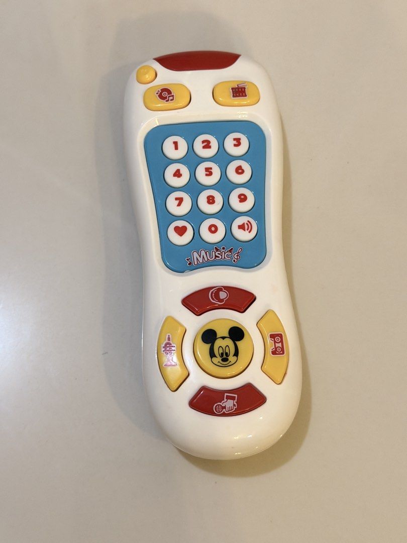 Disney Mickey Mouse Music Toy Remote (Category: Educational & Learning Toys) located in Rizal. Submitted by karlaquijanomd (Listing ID 1461391633, Image 1). Description: - Fun Mickey Mouse music remote for little ones. - Includes number buttons, heart button, and volume control. - Features various sound buttons with icons. - Ideal for playtime and early learning development..