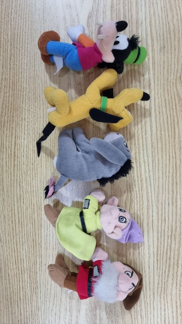 Disney Pluto, Goofy, Eeyore, Dopey, Grumpy Plush Toys (Category: Plushies & Soft Toys) located in Paranaque City. Submitted by olxph_668280920 (Listing ID 1461470131, Image 2). Description: - Set of 5 Disney plush toys - Includes: Pluto, Goofy, Eeyore, Dopey, and Grumpy - Perfect for Disney fans and collectors - Smaller plushies, ideal for display or play magnetic hands price per piece.