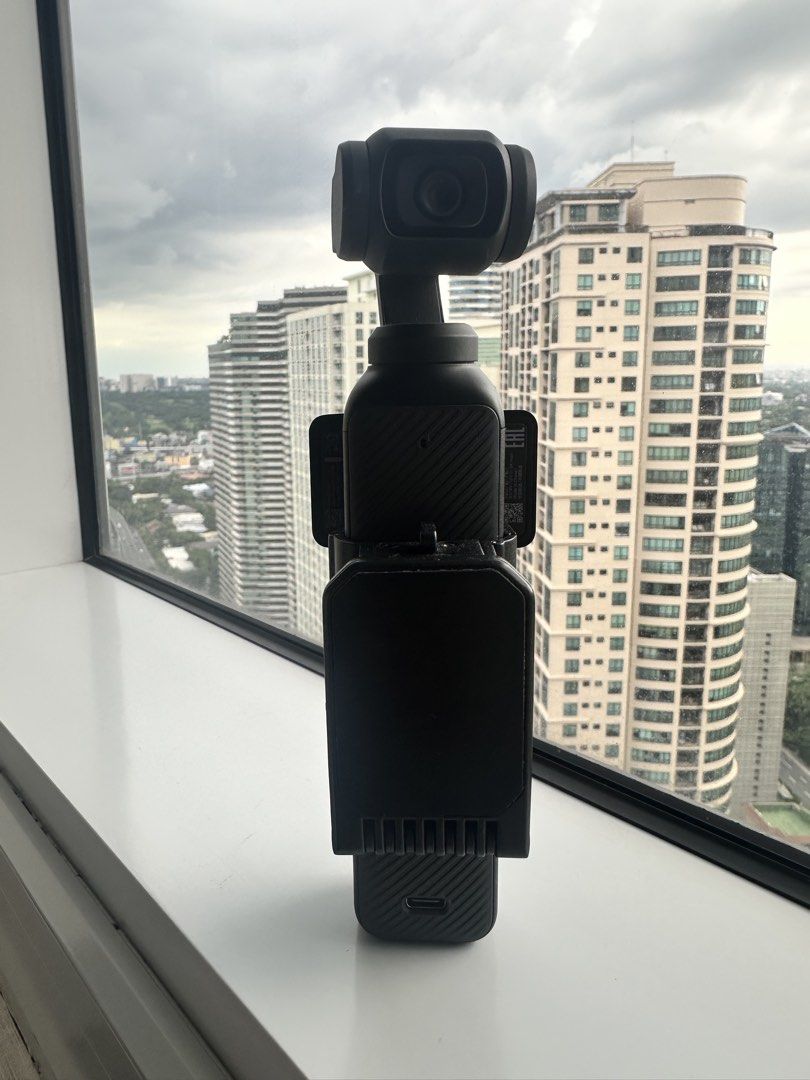Dji Osmo Pocket 3 (Category: Other Gadgets) located in Makati City. Submitted by katecastanares (Listing ID 1461424485, Image 2). Description: DJI OSMO POCKET 3 Standard Combo + Accessories ₱22,000 Slightly Negotiable Bought from DJI Fifth Avenue, New York 🇺🇸 July 2024 Excellent condition • No issues • Complete INCLUDES: * DJI Osmo Pocket 3 * Original box * DJI Mini Tripod * Protective case * Mount/clip * Tripod/extension accessory * Wrist stra