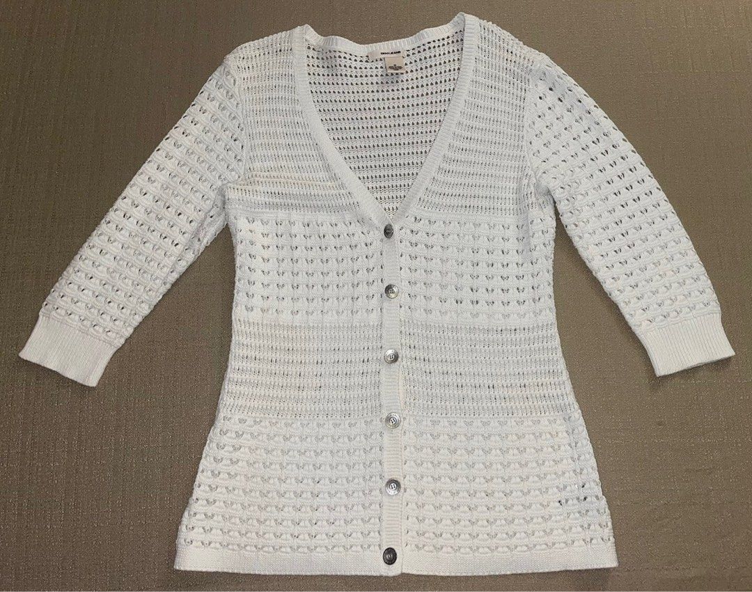 DKNY JEANS Ivory Button-Up Cardigan [L] (Category: Coats, Jackets and Outerwear) located in Malabon City. Submitted by k_intimates (Listing ID 1461549384, Image 2). Description: Details: • Size large • No issues • Ivory open-knit button-up cardigan featuring a lightweight perforated pattern and a classic V-neckline..