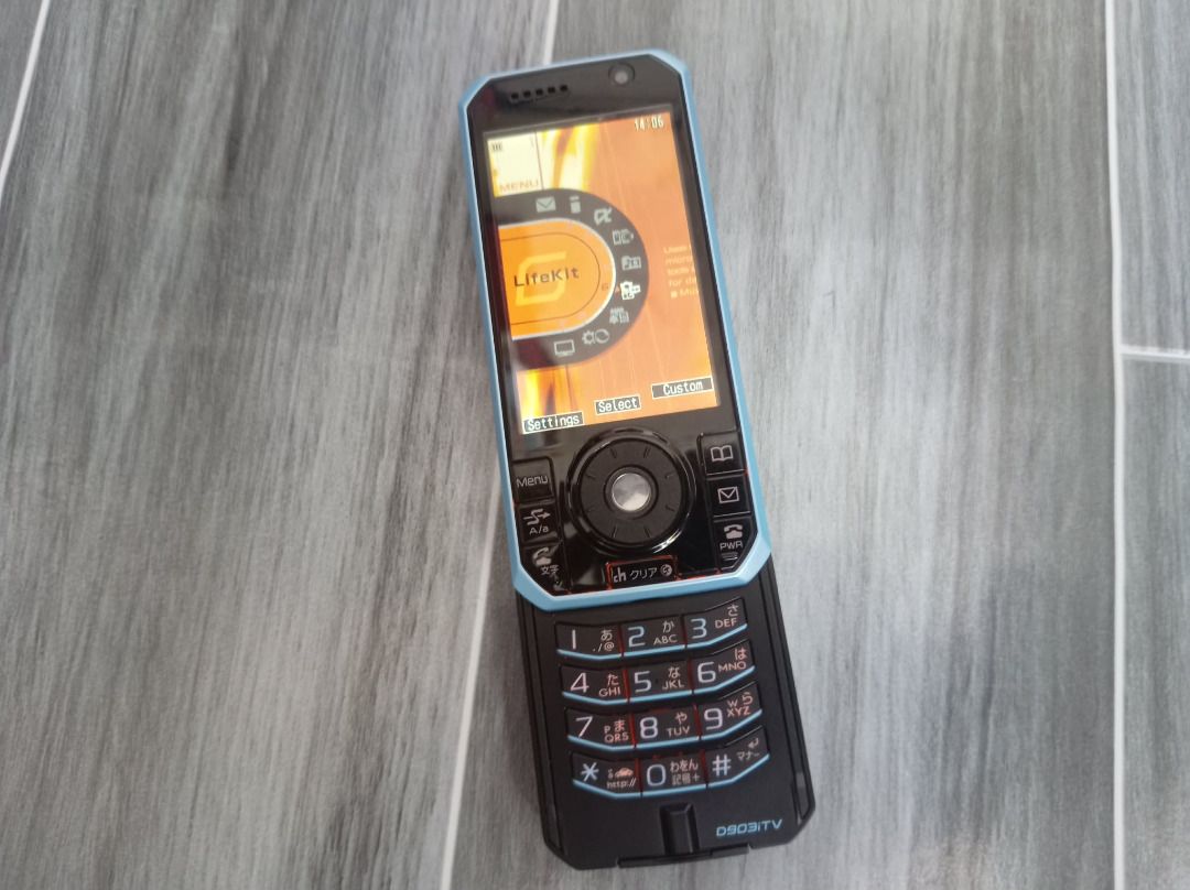 (RUSH SALE‼️)Docomo D903iTV flip phone/slide phone (Category: Early Generation Mobile Phones) located in Moalboal. Submitted by josephjohn47897 (Listing ID 1461401440, Image 3). Description: Docomo D903iTV can be charged using a universal battery charger!(not included) press to slide and a rotating dial and makes the middle part glow! good for collectors! the only issues is that its not openline since it only uses japanese sim cards all in all th