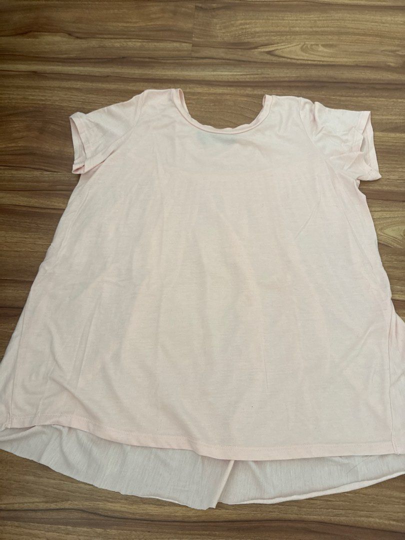 Dorothy Perkins Pink Pleated Tunic Top (Category: Blouses) located in Pasig City. Submitted by slr1949 (Listing ID 1461561867, Image 1). Description: - Light pink tunic top - Brand: Dorothy Perkins - Features a pleated front detail - Short sleeves - Relaxed fit - Ideal for casual wear - Easy to pair with jeans or leggings.