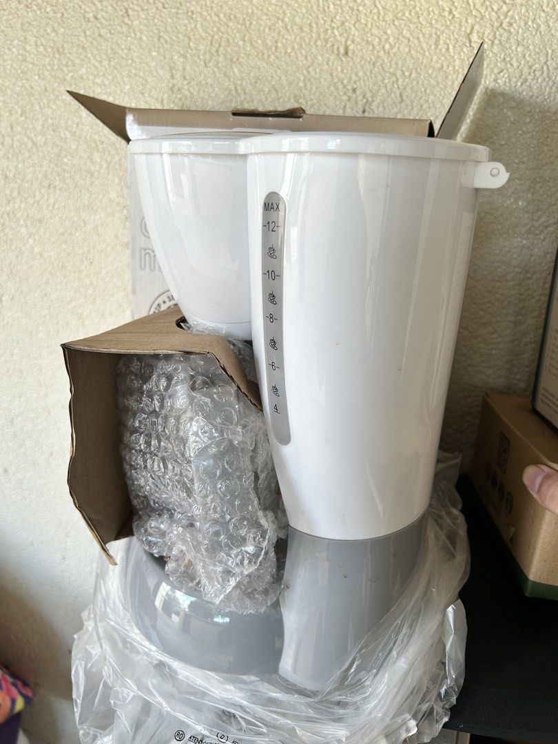 Dowell Coffee Maker CM-1050 (Category: Coffee Machines & Makers) located in Paranaque City. Submitted by pyassszzzi (Listing ID 1461365924, Image 2). Description: - Dowell Coffee Maker CM-1050 - Brews up to 10 cups - Anti-drip feature for mess-free pouring - Durable tempered glass carafe - Comes with original box - Ideal for your everyday coffee ritual.