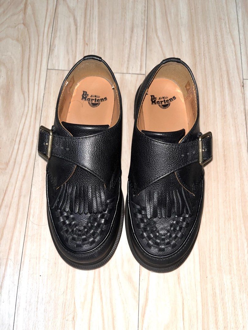 Dr. Martens Ramsey Westminster Leather Buckle (Category: Loafers) located in Manila. Submitted by aj_x007 (Listing ID 1461485589, Image 2). Description: - Brand: Dr. Martens - Style: Monk Strap Shoes - Color: Black Leather - Features: Fringe detail on toe, buckle closure - Sole: Chunky sole for comfort and style - Size: UK 4 - Versatile: Perfect for dressing up or down RSF: Bought it last April 2026. Will buy a size 7. .
