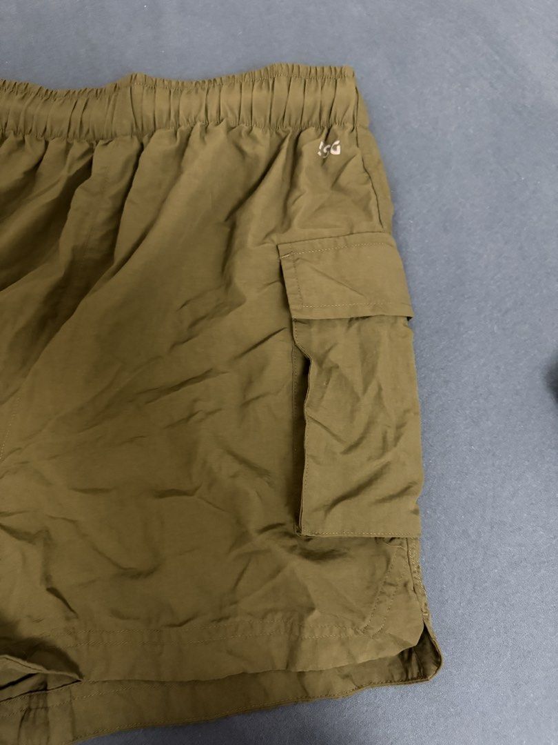 DSG Olive Green Cargo Shorts XS (Category: Shorts) located in Imus. Submitted by kivecart (Listing ID 1461452683, Image 3). Description: - DSG Cargo Shorts - Color: Olive Green - Size: XS - Material: 100% Nylon - Features: Elastic waistband with drawstring, two side cargo pockets - Ideal for: Casual wear, sports activities mop: bpi/maribank/gcash mod: jnt/lalamove loc: Imus Cavite .