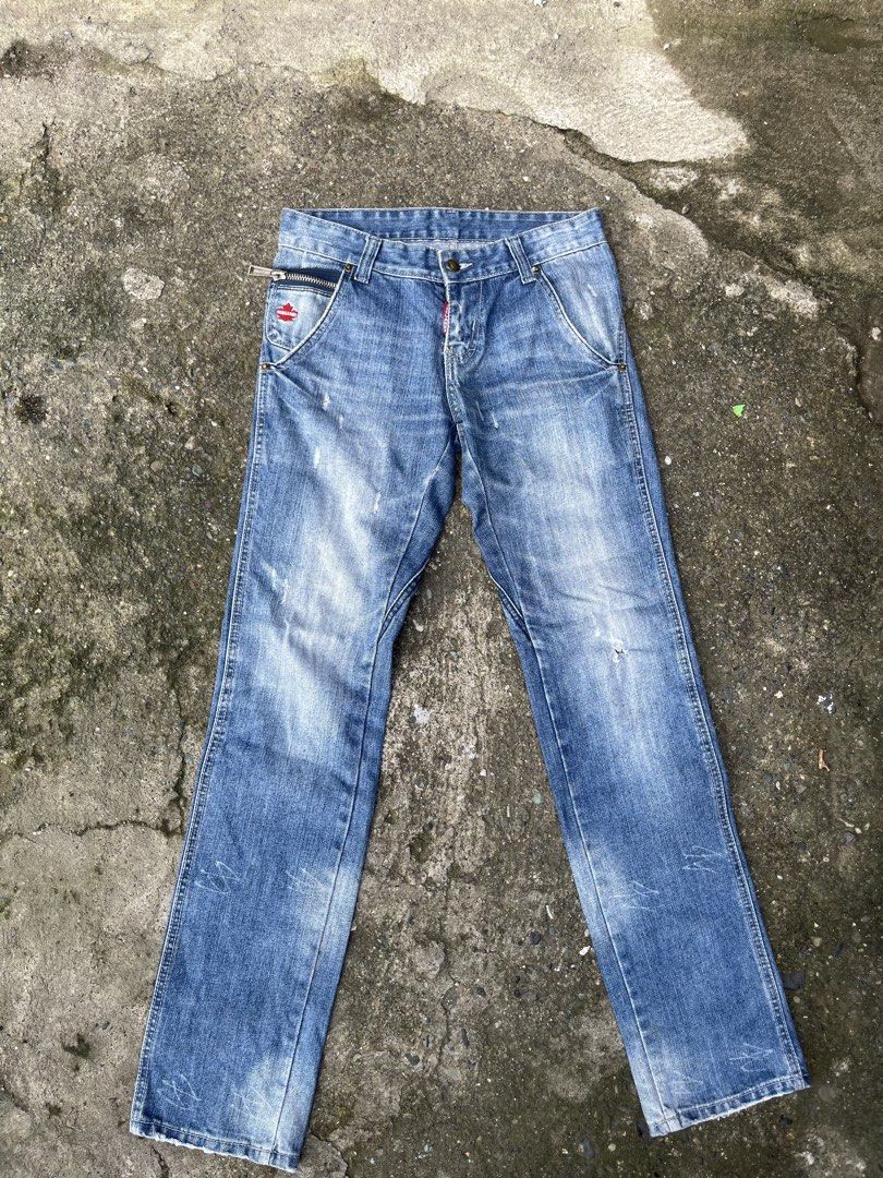 DSQUARED2 (Category: Jeans) located in Gapan. Submitted by jamminandcrackin (Listing ID 1461427999, Image 3). Description: - Authentic DSQUARED2 jeans - Classic blue denim with distressed wash - Iconic DSQUARED2 logo patch on back pocket - Zipper fly with button closure - Unique pocket details - Perfect for a casual, stylish look.