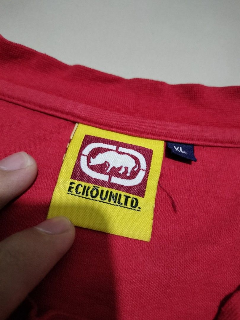 Ecko Unltd. Big Logo Red Tee (Category: Tshirts & Polo Shirts ) located in San Mateo. Submitted by jhaixsober (Listing ID 1461519990, Image 2). Description: DIMES LENGTH 30 WIDTH 24 -EXCELLENT CONDITION -COLOR RATE 10/10 LOCATION: QUEZON CITY COURIER: J&T AND LALAMOVE MOP: GCASH ONLY.