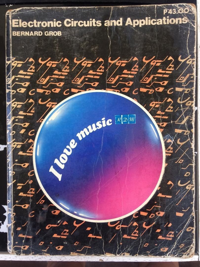 Electronic Circuits and Applications by Bernard Grob (Category: Textbooks) located in Naic. Submitted by cymelpochos (Listing ID 1461503004, Image 1). Description: - Electronic Circuits and Applications textbook by Bernard Grob - Features circuit board patterns and 'I love music' graphic on cover - Ready for new owner.