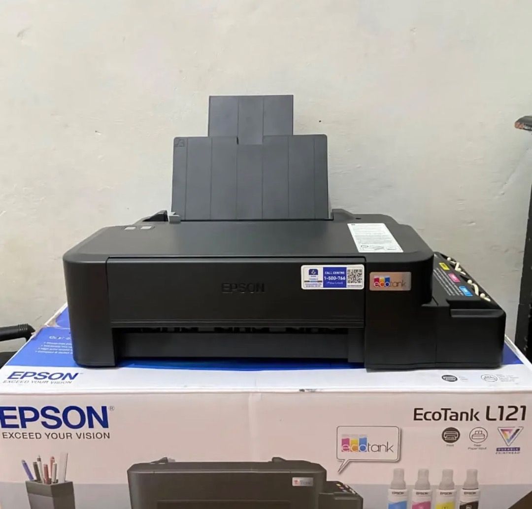 Epson EcoTank L121 Printer (Category: Printers, Scanners & Copiers) located in Caloocan City. Submitted by quickcloud_01b0c5 (Listing ID 1461550892, Image 1). Description: - Epson EcoTank L121 Printer - Includes ink tanks - Ideal for home or office use - Original box and packaging included - Ready to print.