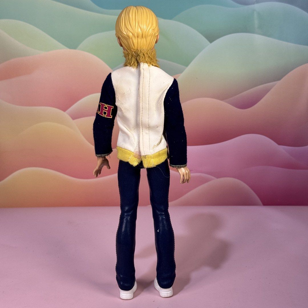 Ever After High Daring Charming Doll (Category: Kids Toys) located in Cebu City. Submitted by danzysdaintydollies (Listing ID 1461433253, Image 2). Description: - Ever After High Daring Charming doll - Varsity-style jacket with blue sleeves, white body, gold trim, and 'E' patch -pls check photos for flaw on jacket, missing crown - Dark blue pants - White sneakers.