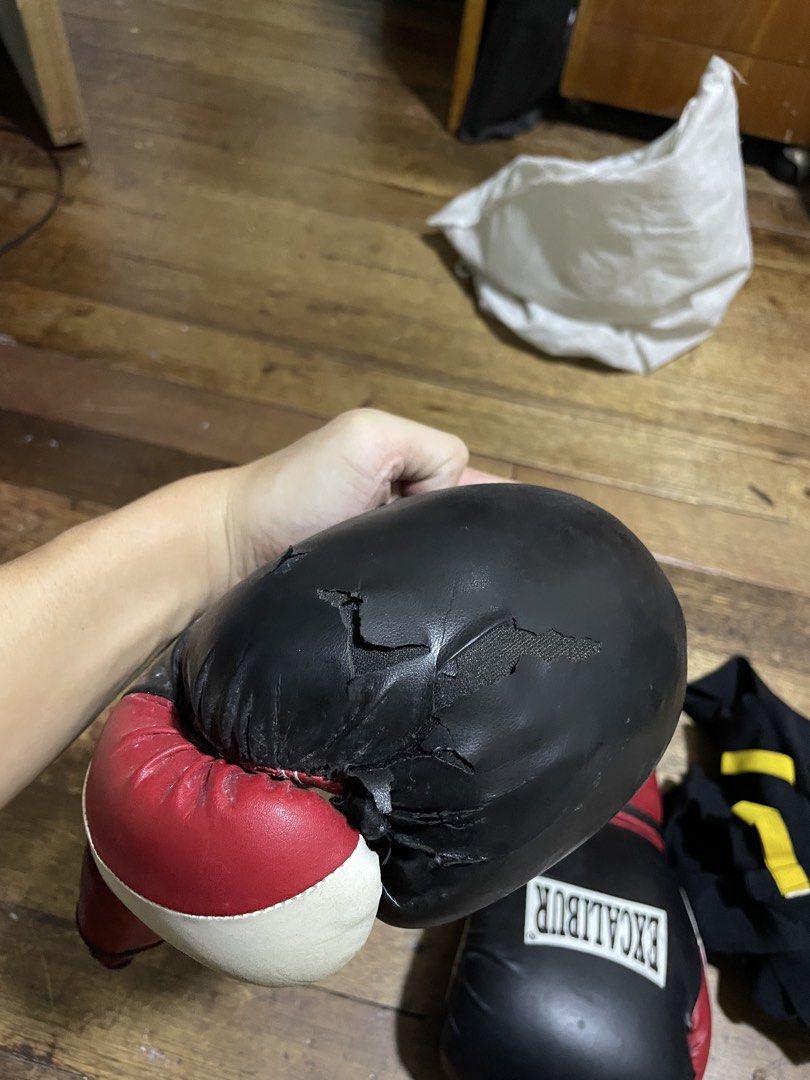 Excalibur Boxing Gloves with Hand Wrap (Category: Combat Sports) located in Mandaluyong City. Submitted by _mksmt (Listing ID 1461372865, Image 2). Description: -signs of usage -needs cleaning PHP750 ONLY.
