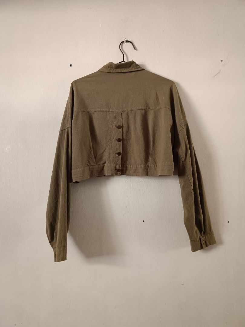 Favlux Olive Green Cropped Button-Up Jacket (Category: Coats, Jackets and Outerwear) located in Manila. Submitted by shajanina.14 (Listing ID 1461460050, Image 3). Description: Favlux Preloved As good as new Medium on the tag As per measuring tape, Bust- up to 48 inches Waist- up to 48 inches Length- 16 inches .