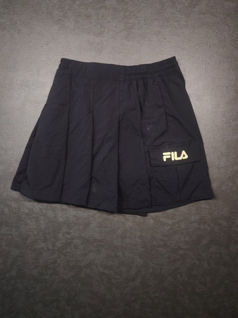 Fila Woven Skort (Category: Activewear) located in Kalibo. Submitted by relivethearchives (Listing ID 1461464734, Image 1). Description: Fila Woven Skort in Excellent Condition Best fit X-Small to Small DIMES Waist: 23 stretch up to 27 Length: 13 📍 Need Wash.