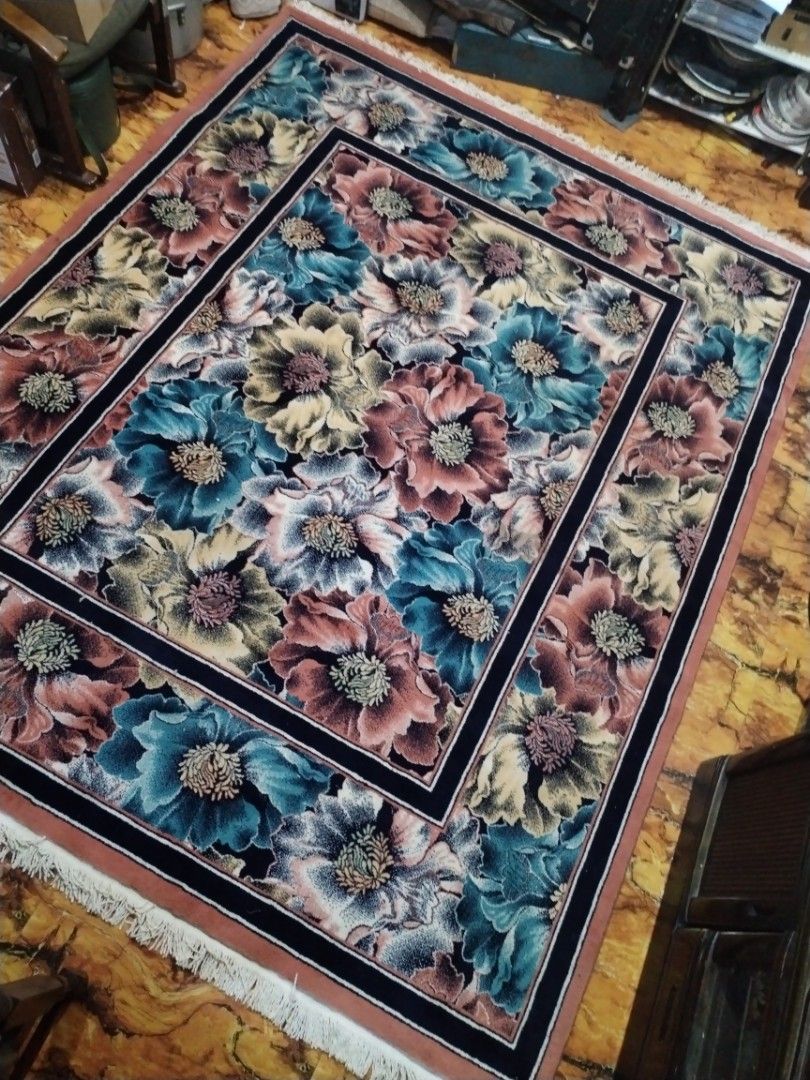 Floral Area Rug 79x96 (Category: Carpets, Mats & Flooring) located in Caloocan City. Submitted by rowely_jpn (Listing ID 1461460194, Image 1). Description: Japan surplus Large area rug with a vibrant floral pattern. Features shades of pink, blue, and yellow flowers. Has a dark border and fringed edges. Measures 79 by 96 inches. Adds color to any room. Great for living room or bedroom..