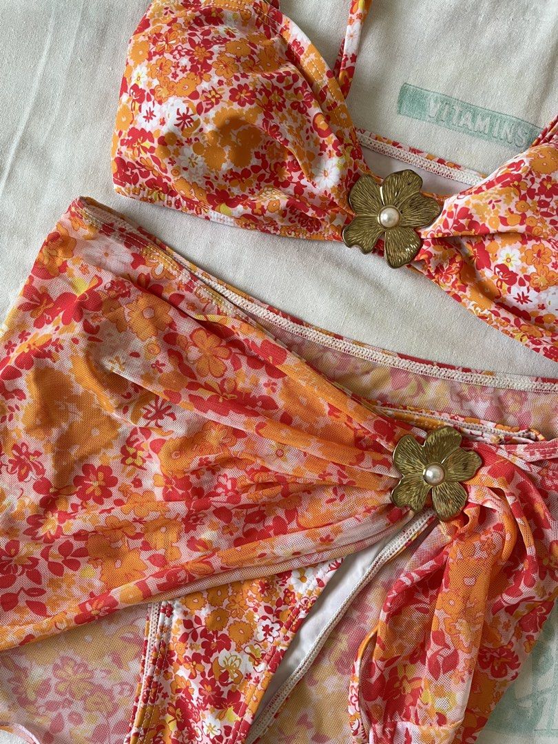 Floral Pink + Orange Swimsuit | Small (Category: Bikinis & Swimsuits) located in Mandaluyong City. Submitted by shaifromthevault (Listing ID 1461350699, Image 2). Description: - a cover up skirt is included - comes with padding - lalamove/angkas delivery only - mandaluyong area.