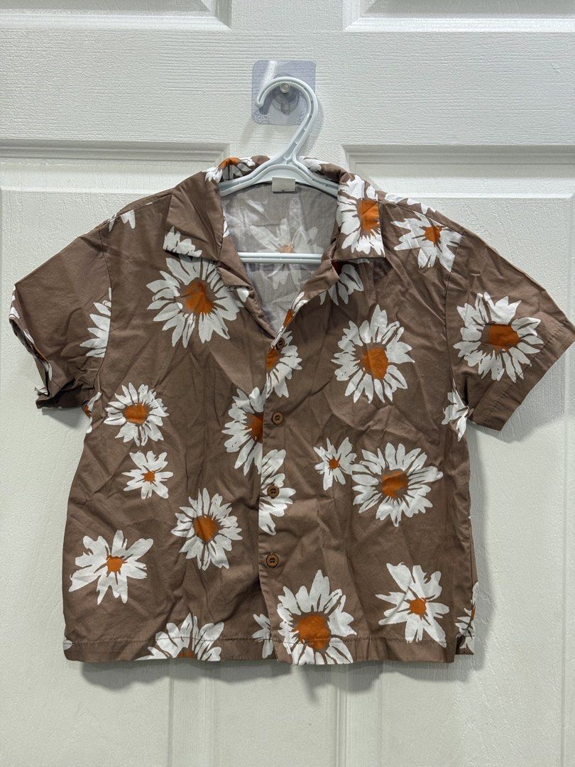 FLORAL POLO | KIDS (Category: Babies & Kids Fashion) located in Taguig. Submitted by _decluttermomma_ (Listing ID 1461403433, Image 1). Description: FLORAL BUTTON DOWN POLO FOR AGE 5Y.