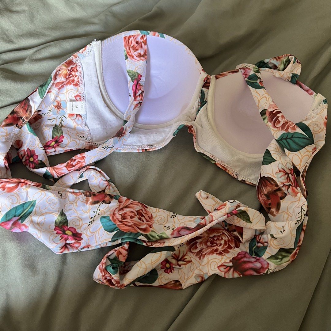 Floral Print High Waisted Bikini Set Size M (Category: Bikinis & Swimsuits) located in Pasig City. Submitted by cormatzu (Listing ID 1461393287, Image 3). Description: - Adorable floral print bikini set - Flattering high-waisted bottoms - Padded bra top with adjustable straps for a perfect fit - Comfortable and stylish for any summer occasion - Size: Medium - Origin: Made in China - Never worn!.