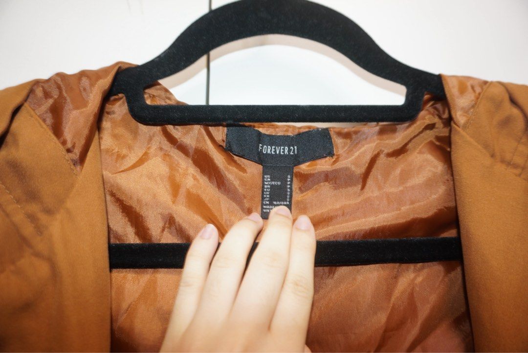 Forever 21 Brown Jacket (Category: Coats, Jackets and Outerwear) located in Bacoor. Submitted by ynnasdrawer (Listing ID 1461409320, Image 2). Description: - barely used - soo cutee - very soft - can be adjusted in the waist area - rfs: decluttering .