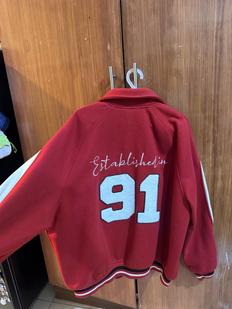 Forever 21 Red Varsity Jacket LA Established 91 (Category: Coats, Jackets and Outerwear) located in Manila. Submitted by ianventory (Listing ID 1461397124, Image 3). Description: - Forever 21 varsity jacket in red - White sleeves - 'LA' graphic on the front - 'Established 91' graphic on the back - Ribbed cuffs and hem - Button-up front - Ideal for casual wear.