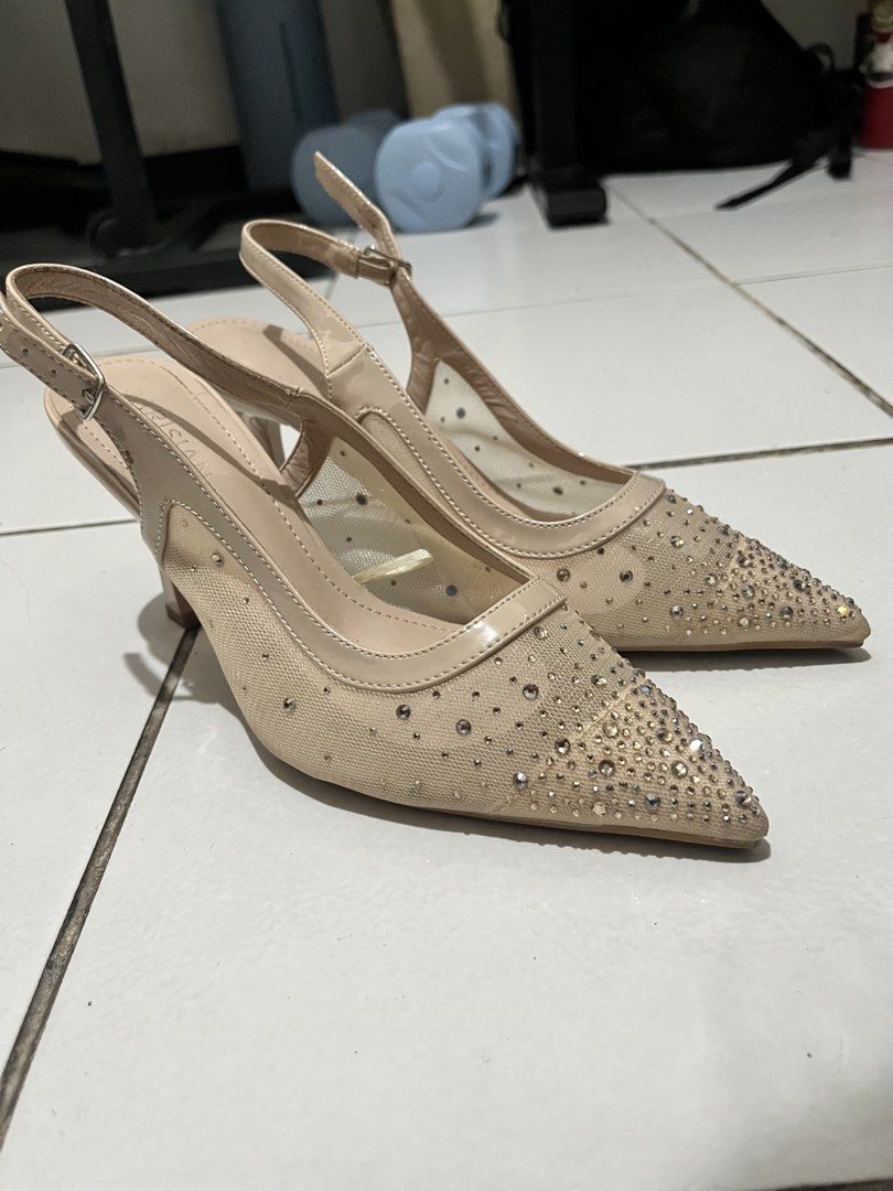 Parisian Heels (Category: Heels) located in Binan City. Submitted by jeremylijah (Listing ID 1461360012, Image 1). Description: - Nude slingback heels - Rhinestone embellishments on the toe - Mesh detailing on the sides - strap at the back - Comes with original box - Size 7 Meet up points: Pacita, San Pedro Laguna Makati - Glorietta .