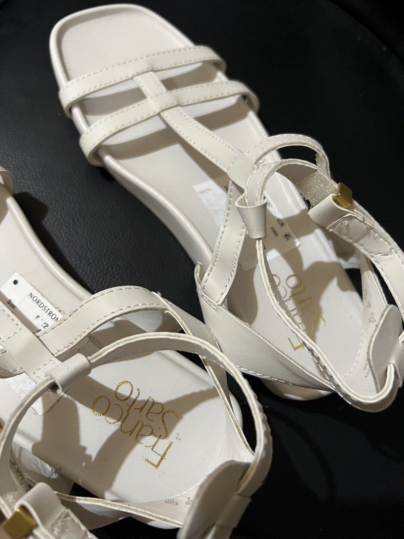 Franco Sarto White T-Strap Flat Sandals (Category: Flats & Sandals) located in Cabanatuan. Submitted by imported2023 (Listing ID 1461435813, Image 2). Description: - Brand: Franco Sarto - Color: White - Style: T-strap flat sandals - Features: Ankle buckle closure - Size: 8.5 US - Origin: Purchased from Nordstrom - Versatile: Perfect for casual outings or elevating simple outfits kasya sa size 9 to. ang tibay na brand.
