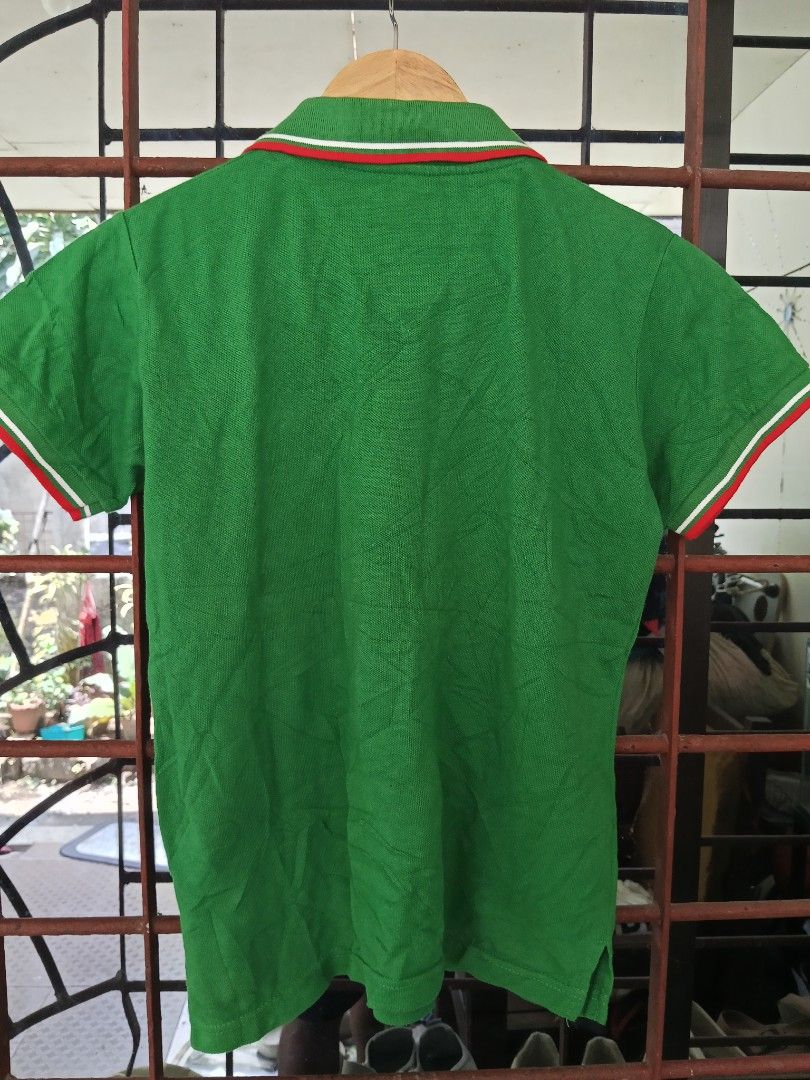 Fred Perry Green Polo Shirt M (Category: Shirts) located in Davao. Submitted by carnopaul76938 (Listing ID 1461491189, Image 2). Description: - Brand: Fred Perry - Color: Green - Size: Medium (M) women - Features: Iconic red laurel wreath logo - Details: Red and white trim on collar and cuffs - Material: 100% Cotton Pique - Style: Casual wear.