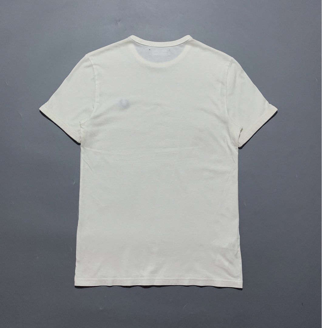 Fred Perry White Tee (Category: Activewear) located in Mabalacat. Submitted by thrift_trap (Listing ID 1461529291, Image 2). Description: Dimes: W17 x L26 (Size: XS on tag) Condition: Good Issue (s): Minimal stain & repaired 2 pinhole (unnoticeable) Color rate: 9/10 Complete tags🏷️ Color may vary due lighting‼️.