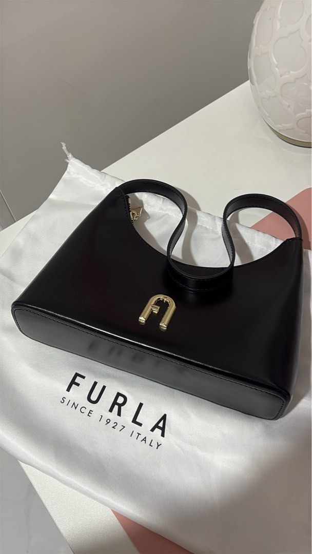 Furla Shoulder Bag (Category: Shoulder Bags) located in Quezon City. Submitted by kishee (Listing ID 1461527515, Image 1). Description: Like New Condition. 100% Authentic :).