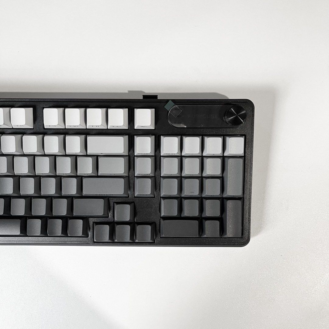 Furycube IP98S Pro Membrane Keyboard (Category: Computer Keyboard) located in Gasan. Submitted by sellcouth (Listing ID 1461419018, Image 2). Description: Furycube IP98S PRO (never used) RFS: Decluttering Key DetailsType: Wireless membrane keyboard (not a true mechanical keyboard, but features a mechanical-feel design). Features: Includes an intelligent knob and 6 unique sound effects (Piano, Water Drop, Typewriter, Duck Quack, Snow Step) activat