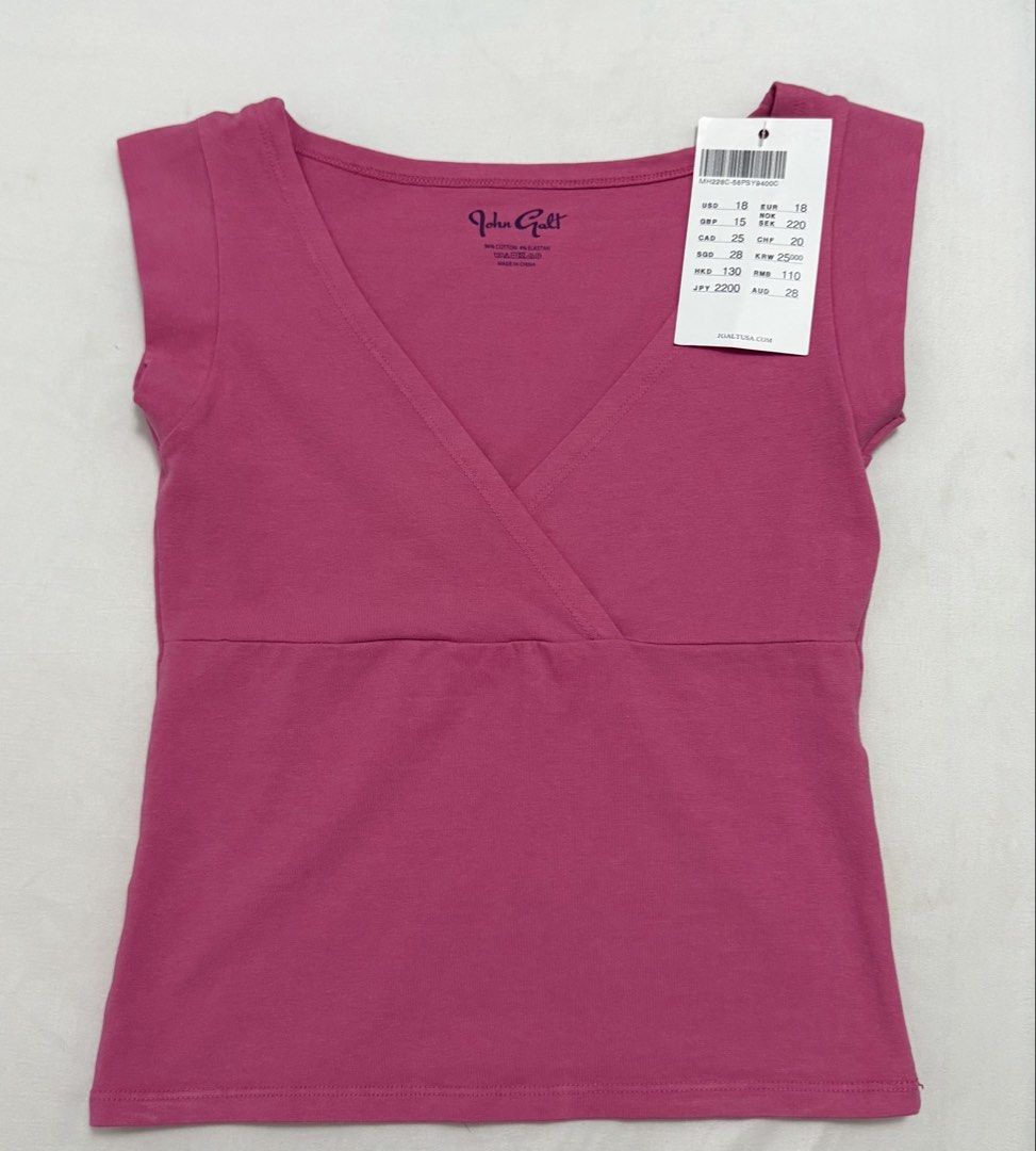 Fuschia/Pink Brandy Melville Amara Tank (Category: Sleeveless) located in Manila. Submitted by velvetmood (Listing ID 1461480412, Image 1). Description: Purchased online and delivered to my US address. Brand new, still with tags because NEVER WORN. Rfs: color doesn't suit me :) but super perfect for those who love pink! Fyi, this was ordered on the Brandy Melville USA website but the embossed logo inside is John Galt. It's the same brand, John Ga