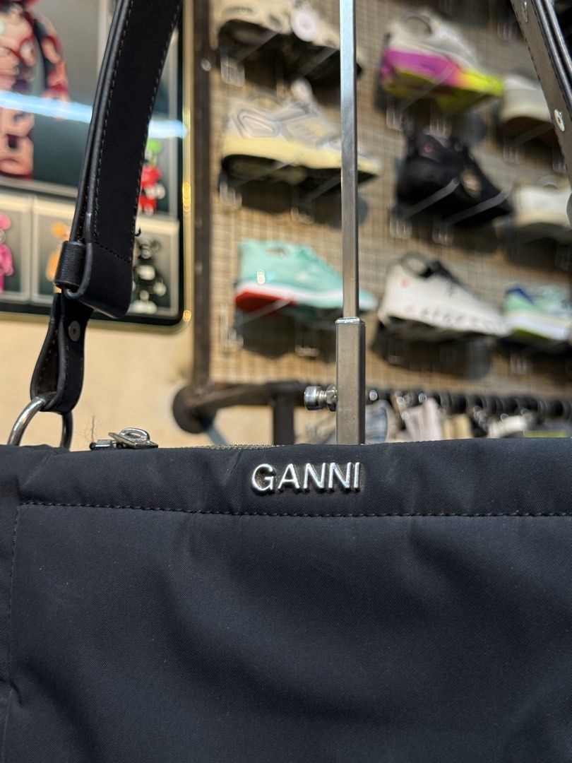 GANNI Black Nylon Shoulder Bag (Category: Luxury Bags & Wallets) located in Legazpi City. Submitted by keantuttt (Listing ID 1461519191, Image 2). Description: - Classic black GANNI shoulder bag - Made from durable nylon - Features stylish leather straps - Secure zipper closure - Interior GANNI label - Simple and chic design - Ideal for everyday use.