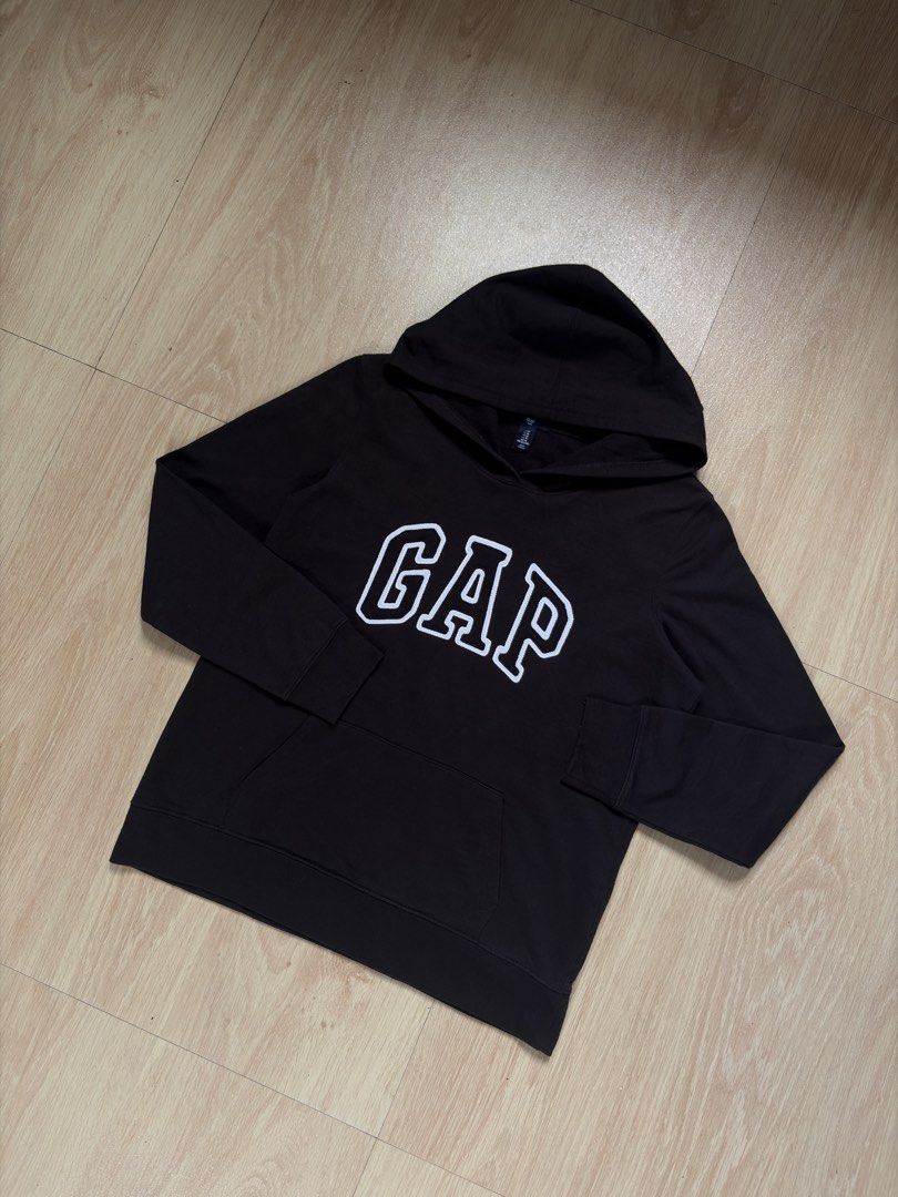 GAP Black Hoodie with White Logo (Category: Hoodies) located in Manila. Submitted by pusherneeds (Listing ID 1461488811, Image 1). Description: - Classic black GAP hoodie - Iconic white GAP logo on chest - Front pocket - Adjustable hood - Versatile for casual outfits.