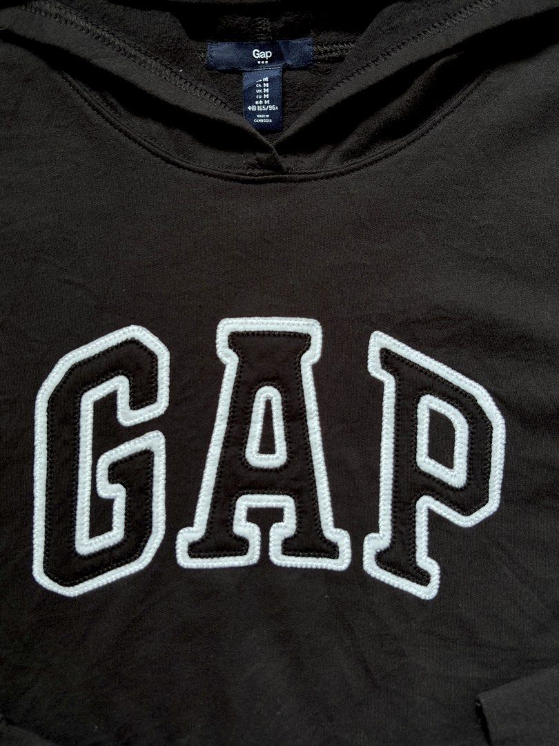 GAP Black Hoodie with White Logo (Category: Hoodies) located in Manila. Submitted by pusherneeds (Listing ID 1461488811, Image 2). Description: - Classic black GAP hoodie - Iconic white GAP logo on chest - Front pocket - Adjustable hood - Versatile for casual outfits.
